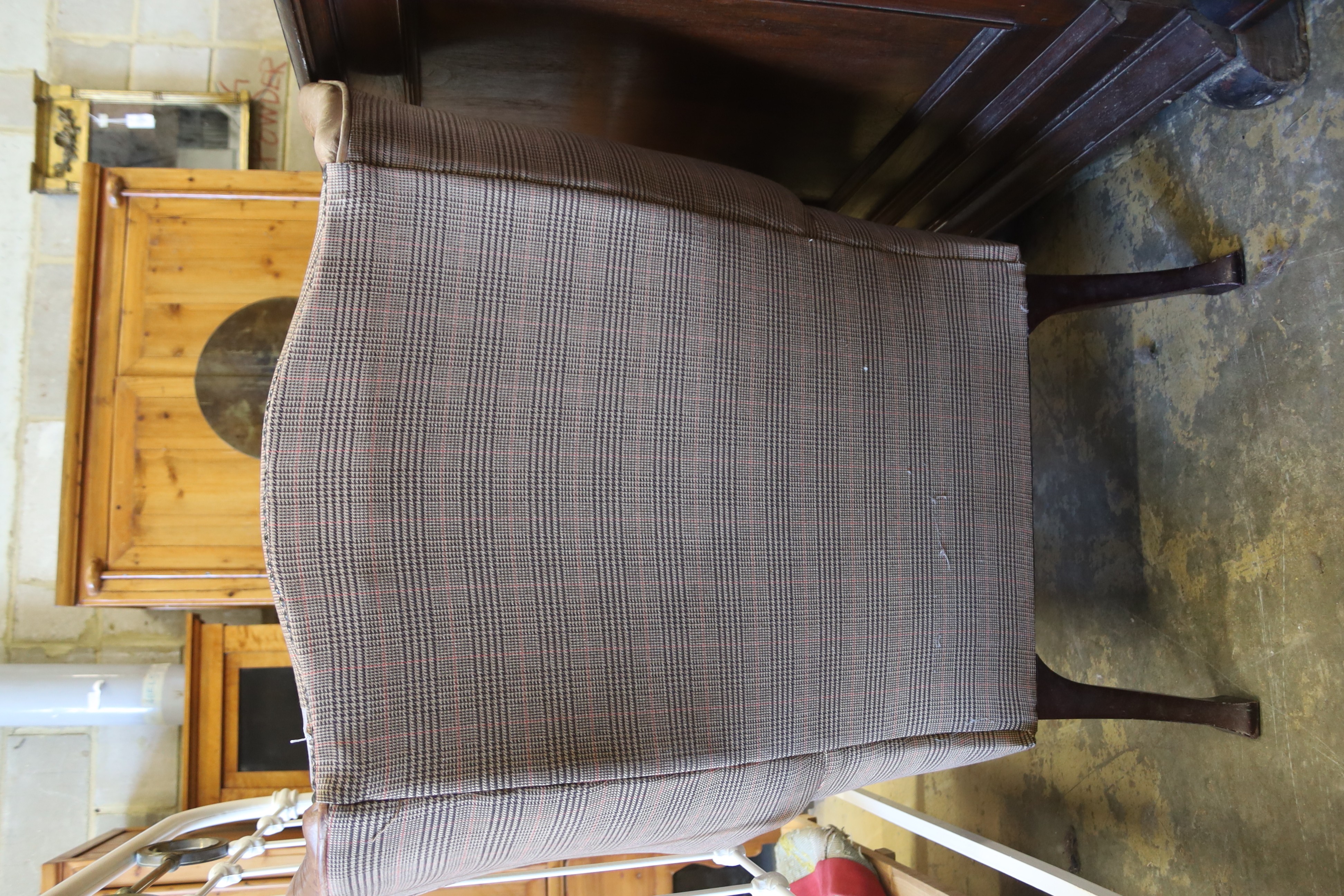 A Victorian style tweed and tan leather wing armchair, width 80cm, depth 84cm, height 98cm